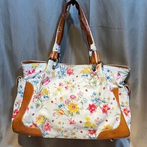 Cecconi Piero Italian leather  Floural print.    10-H10Db